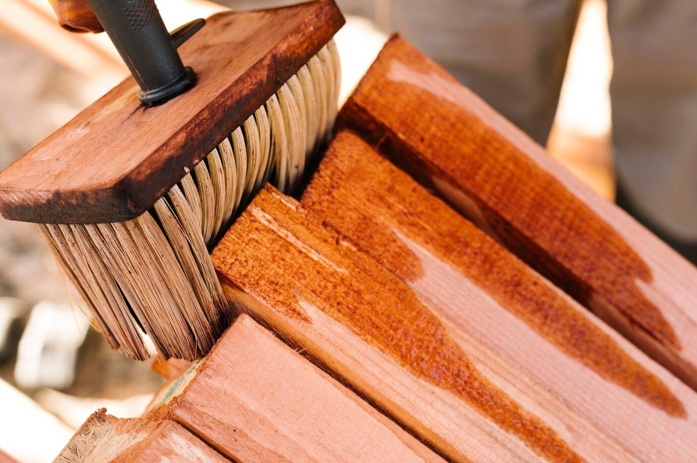 person-varnishing-wood-with-big-brush_23-2148748819.jpg